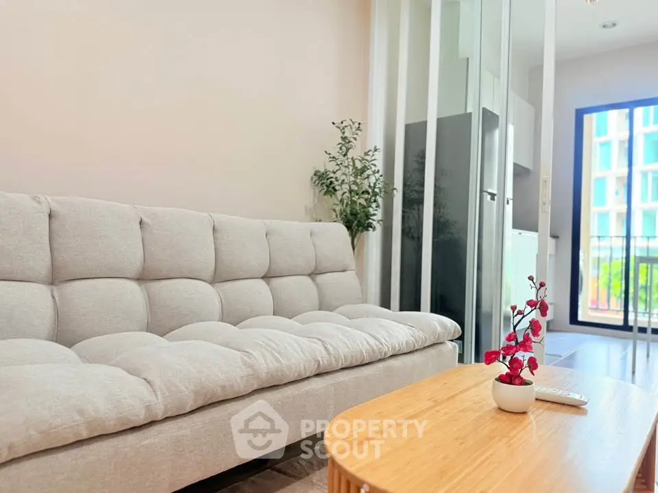 Modern living room with cozy sofa and stylish decor in a bright apartment