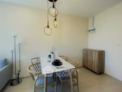 Modern dining area with stylish lighting and wooden furniture