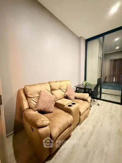 Cozy living room with plush recliner and modern decor