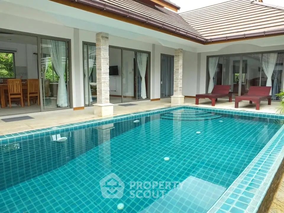 Luxurious villa with private pool and spacious patio, perfect for relaxation and entertaining.
