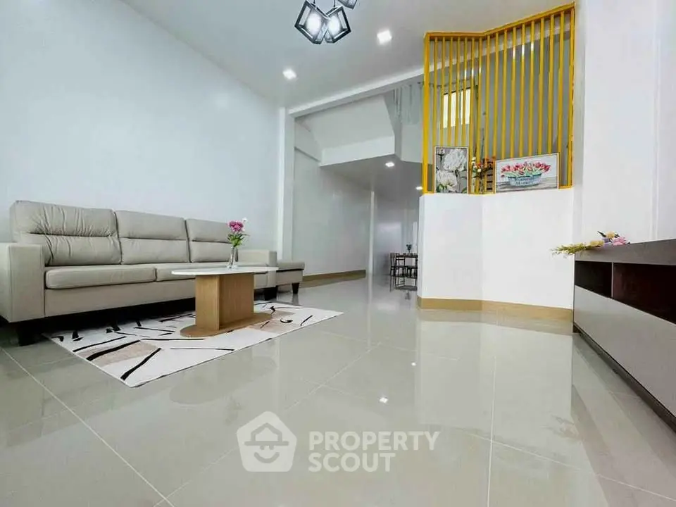 Spacious modern living room with sleek design and elegant furniture