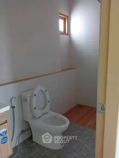 Modern bathroom with natural light and sleek tile design