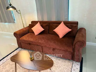 Cozy living room with brown sofa and stylish decor