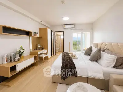 Modern bedroom with elegant decor and scenic view from large windows