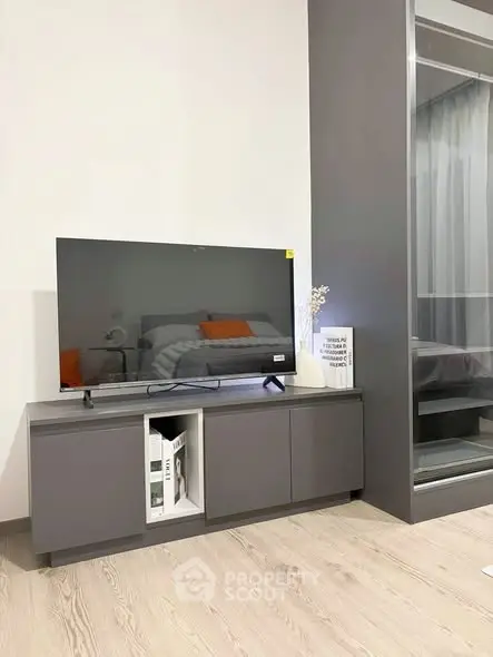 Modern living room with sleek TV stand and stylish decor