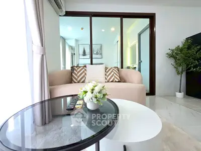 Modern living room with cozy sofa and stylish decor in a bright apartment