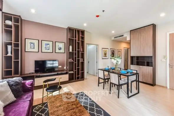 Modern living room with stylish decor and open dining area