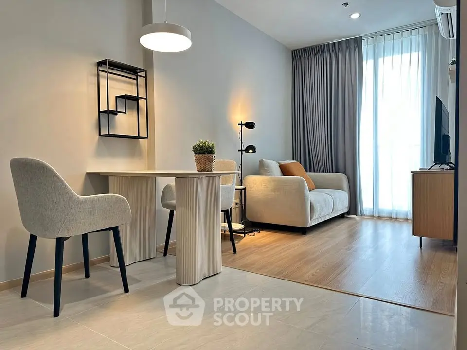 Modern living room with stylish furniture and natural light