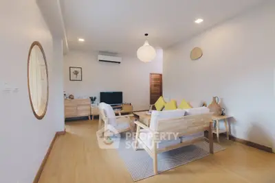 Spacious modern living room with stylish wooden furniture and cozy decor
