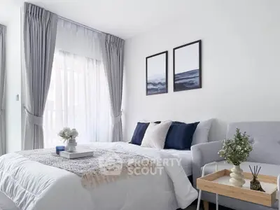 Elegant bedroom with cozy decor and natural light