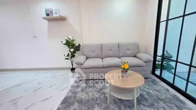 Modern living room with cozy sofa and stylish decor
