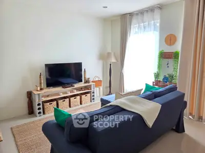 Cozy living room with modern decor and natural light