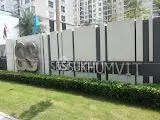 Modern building exterior with S&S Sukhumvit signage and lush greenery.