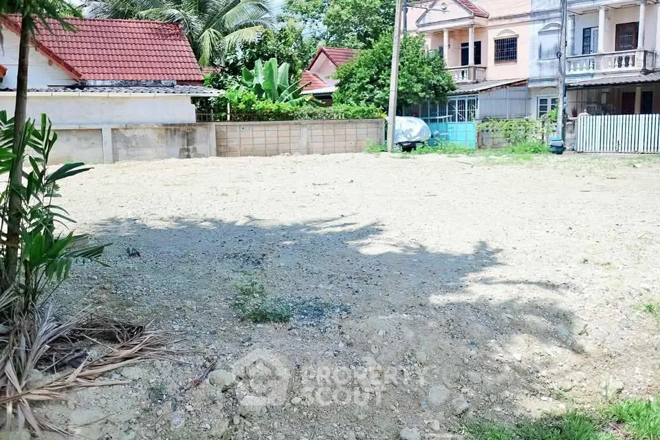 Vacant land plot in a residential area with potential for development.