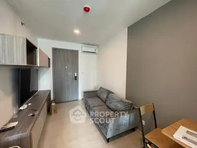 Modern living room with sleek furniture and neutral tones, perfect for urban living.