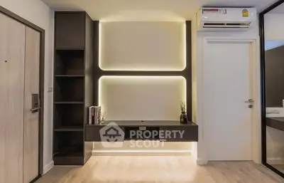 Modern interior with sleek built-in shelving and ambient lighting, perfect for stylish living.