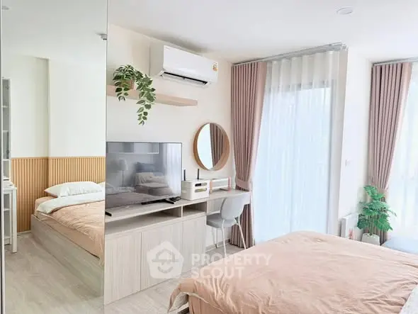 Modern bedroom with stylish decor and natural light