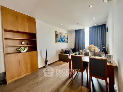 Modern living room with dining area and elegant decor