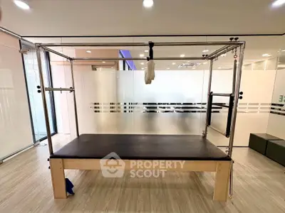 Modern fitness studio with pilates equipment and sleek design