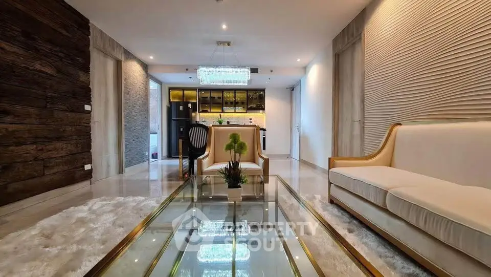 Luxurious modern living room with elegant decor and open kitchen view