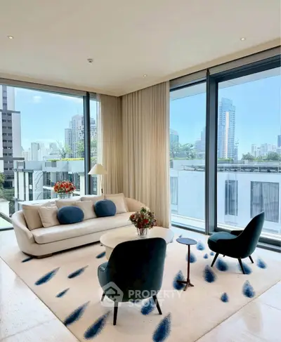 Luxurious living room with panoramic city views and modern furnishings.