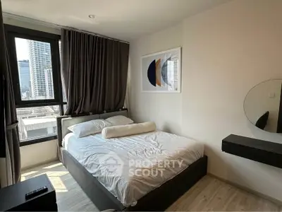 Modern bedroom with city view, featuring stylish decor and ample natural light.