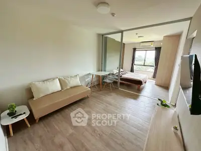 Modern studio apartment with open layout and stylish furnishings