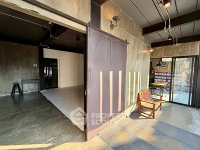 Stylish industrial loft with sliding doors and natural light