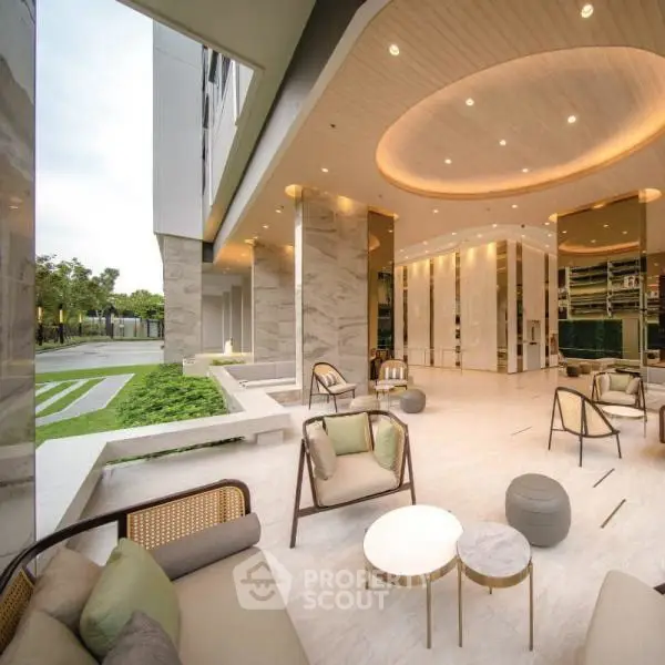 Luxurious modern building entrance with elegant seating and ambient lighting