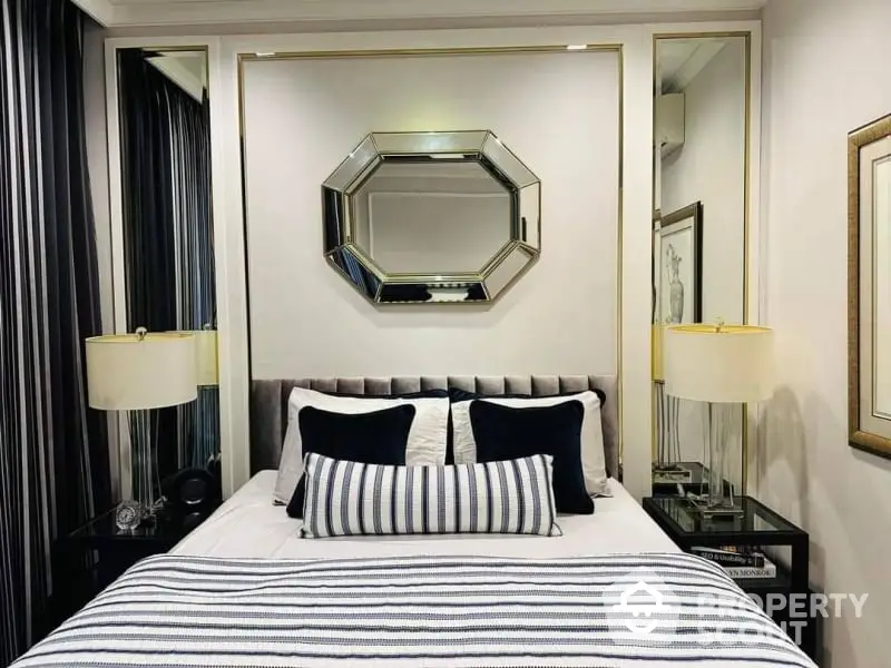 Luxurious bedroom with elegant decor and stylish mirror accents