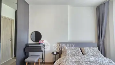 Modern bedroom with stylish decor and natural light