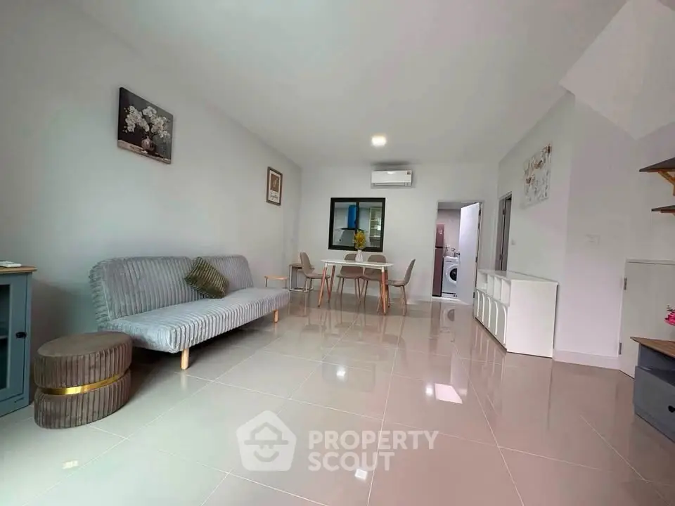 Modern living room with sleek furniture and open layout, perfect for contemporary living.