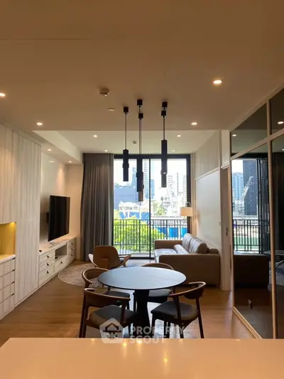 Modern living room with city view, stylish furniture, and elegant lighting in urban apartment.