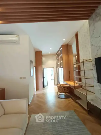 Luxurious modern living room with elegant wooden accents and stylish decor