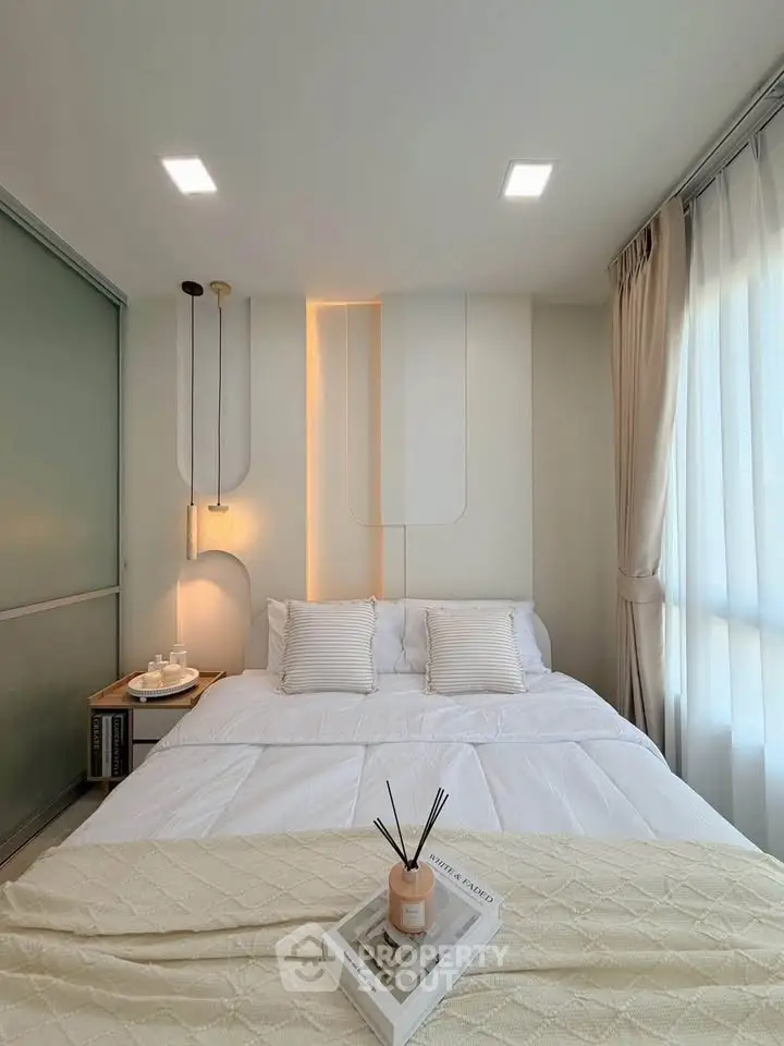 Cozy modern bedroom with elegant decor and natural light