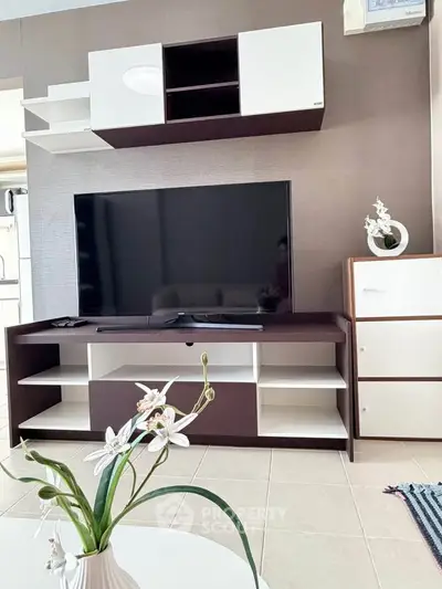 Modern living room with sleek TV unit and stylish decor