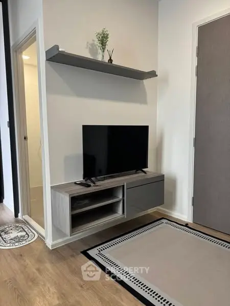 Modern living room with sleek TV stand and minimalist decor
