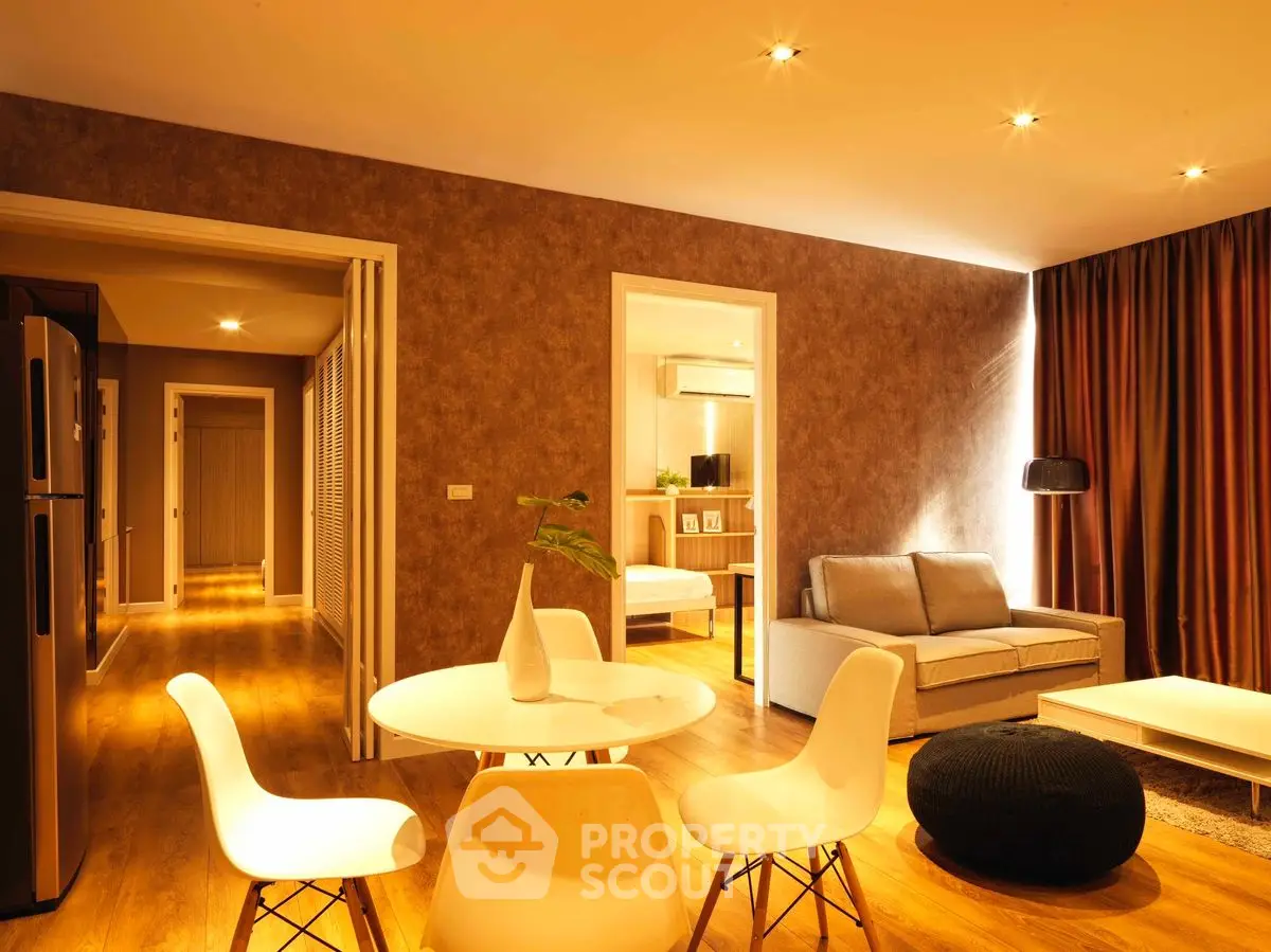 Modern living room with stylish furniture and warm lighting