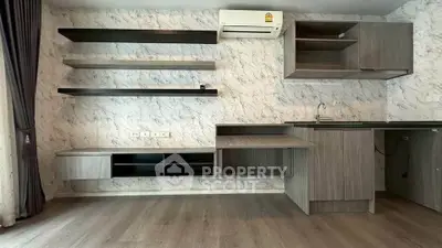 Modern minimalist kitchen with open shelving and sleek cabinetry