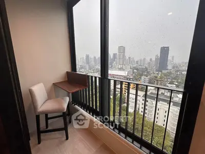 Chic balcony with city view, perfect for relaxation and enjoying the skyline.