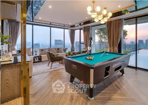 Luxurious living room with pool table and stunning city view