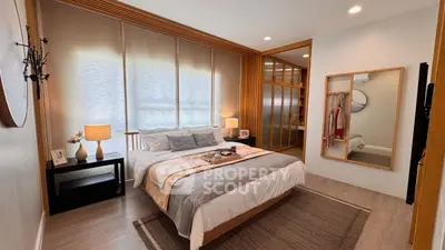 Stylish bedroom with modern decor and ample natural light