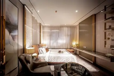 Luxurious modern bedroom with elegant decor and ambient lighting