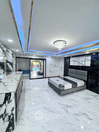 Luxurious marble bedroom with modern lighting and elegant decor