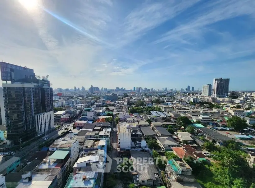 Stunning cityscape view from high-rise building showcasing urban skyline and vibrant neighborhood.