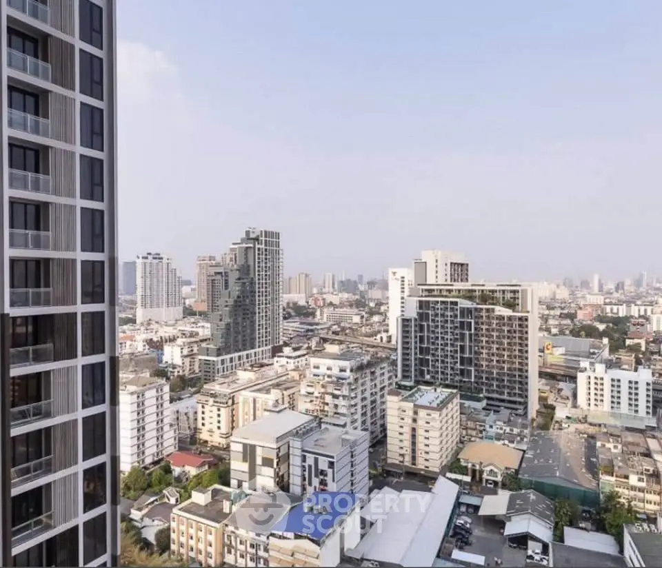 Stunning cityscape view from a high-rise building showcasing modern urban living.