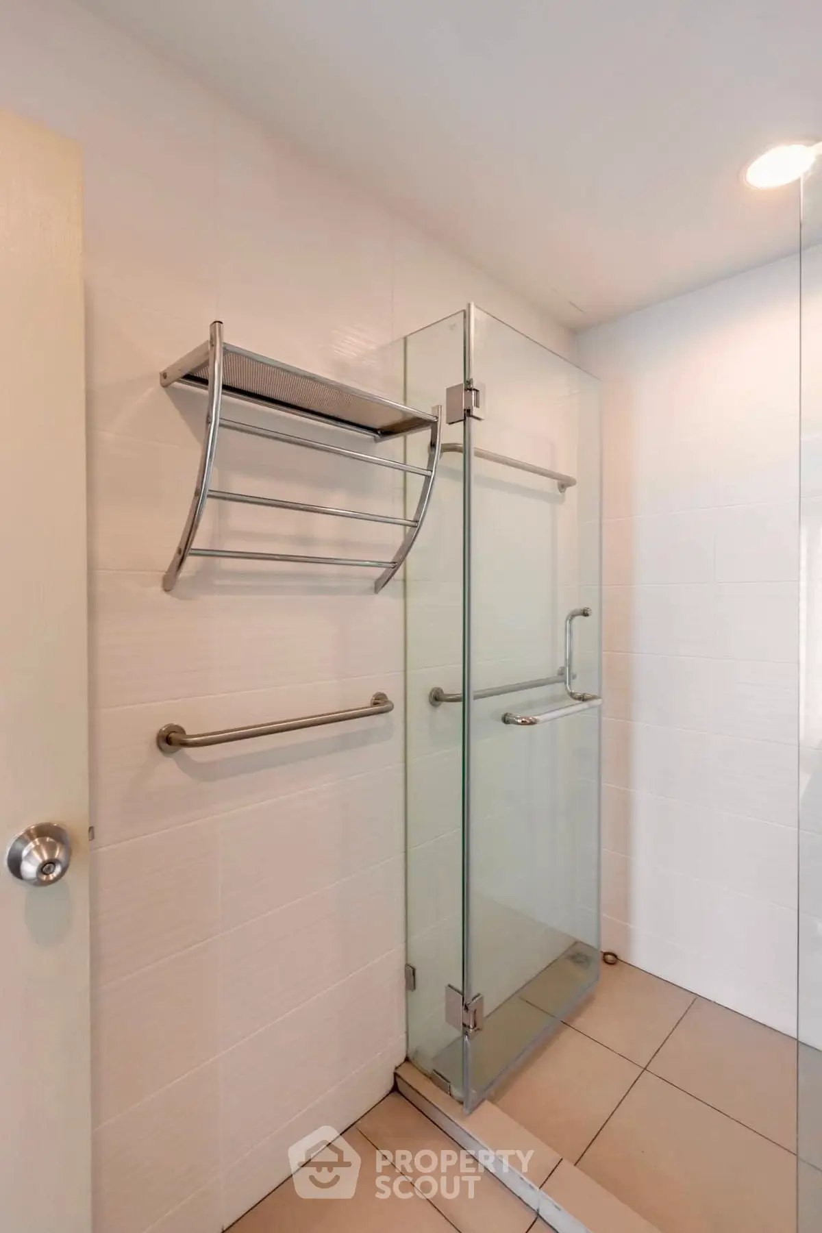Modern bathroom with glass shower and sleek fixtures