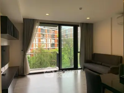 Modern living room with large windows and balcony view in urban apartment