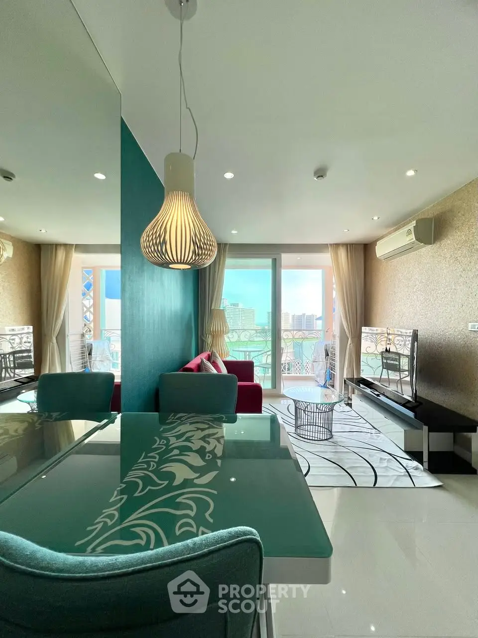Stylish living room with modern decor and city view balcony