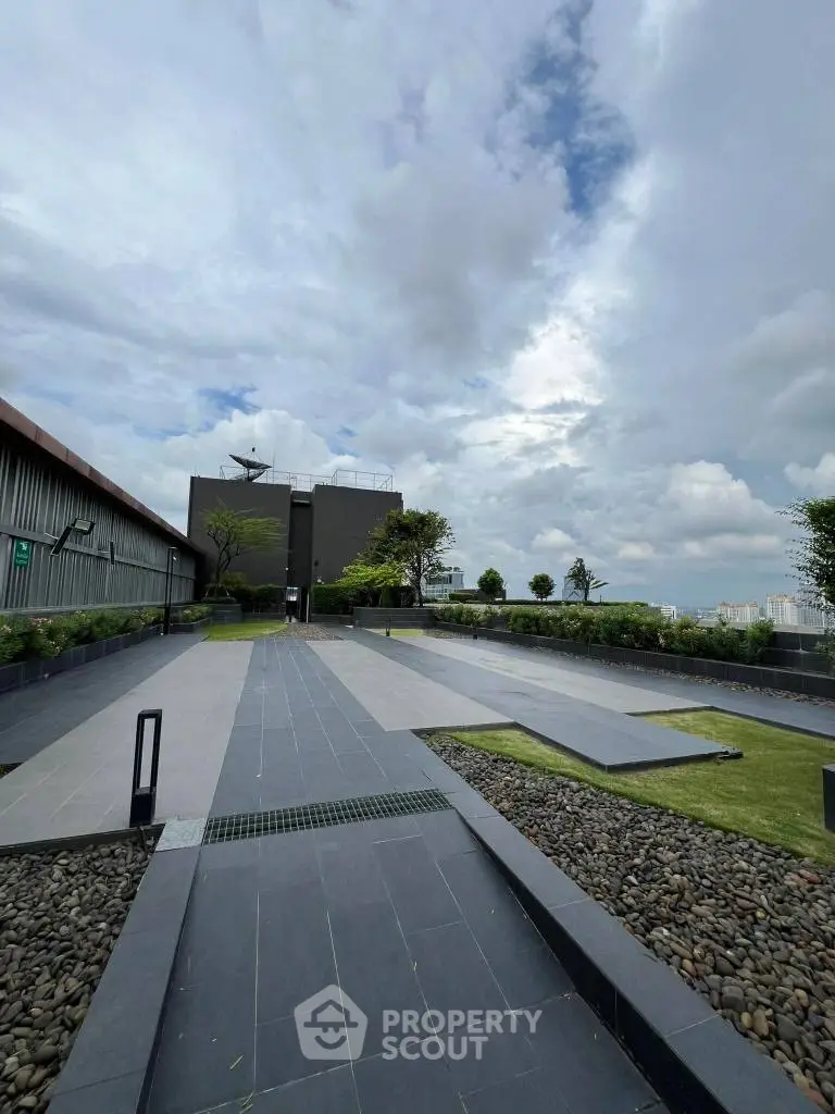 Stunning rooftop garden with modern design and panoramic city views.